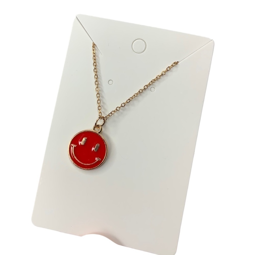 Red and gold smiley face necklace